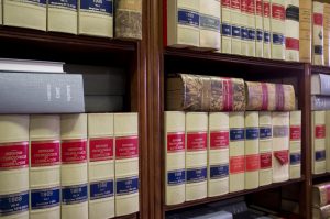 Books of law arranged in a library shelves